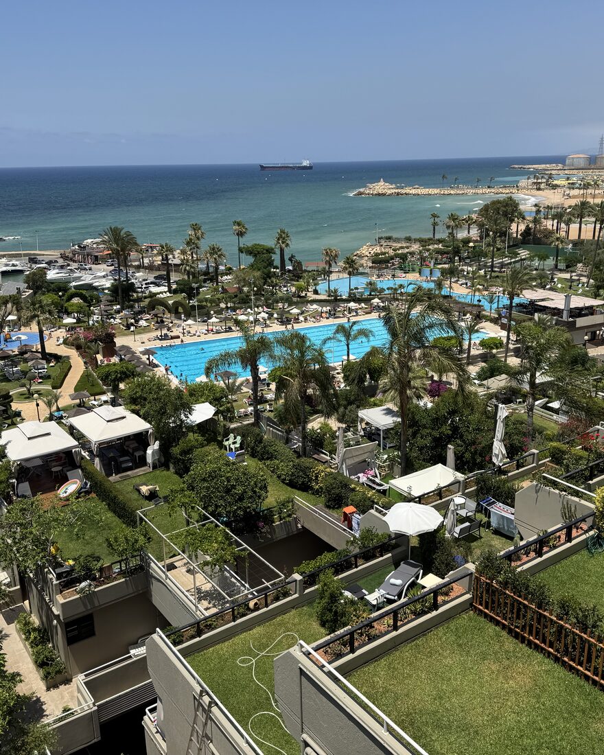 The Holiday Beach chalets in Zouk — gardens, pool and the sea